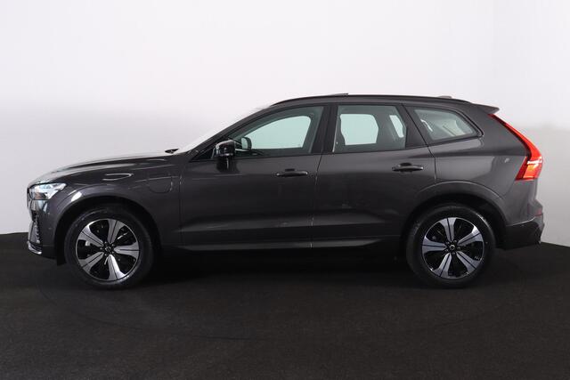 Volvo XC60 T6 Recharge AWD Plus Dark - Panorama/schuifdak - IntelliSafe Assist & Surround - 360º Camera - Verwarmde voorstoelen, stuur & achterbank - Parkeersensoren voor & achter - Elektr. bedienb. voorstoelen met geheugen - Draadloze tel. lader - Elektr. inklapbar