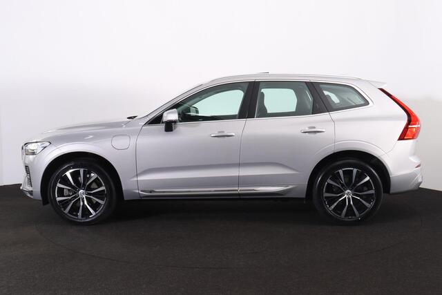 Volvo XC60 T8 Recharge AWD Plus Bright - Panorama/schuifdak - IntelliSafe Assist & Surround - Harman/Kardon audio - Adaptieve LED koplampen - Parkeercamera achter - Verwarmde voorstoelen, stuur & achterbank - Parkeersensoren voor & achter - Elektr. bedienb. voorstoe