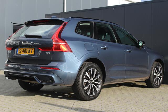 Volvo XC60 B5 Plus Dark | Incl. 12 maanden garantie | Trekhaak | Cruise Control | Verwarmde stoelen | Verwarmd stuurwiel | Apple Carplay/Android Auto | Elektrisch verstelbare voorstoelen | Elektrisch bedienbare achterklep | Lichtmetalen velgen | Bluetooth | DAB