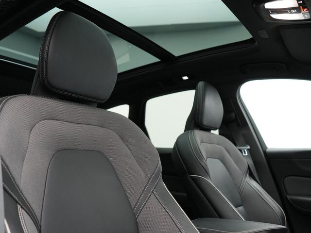 Volvo XC60 T6 AWD R-Design Plug In Hybrid Long Range Nieuw Model 350pk Dealer O.H. PHEV | Panodak | Adaptive Cruise | Camera | Lederen Sportstoelen Memory & Verwarmd | Google Assistent | Apple Carplay | Keyless | Virtual | 21"L.M | DAB |