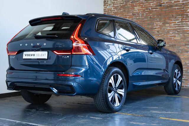 Volvo XC60 T6 Plug-in hybrid AWD Plus Dark | Adaptive cruise control | 360° parkeercamera | BLIS | Wegklapbare trekhaak | Panoramadak | Stoel en stuurwielverwarming | Lederen bekleding | Google infotainment | Parkeersensoren voor + achter