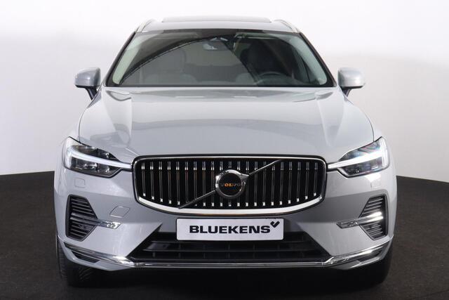 Volvo XC60 T6 Recharge AWD Core Bright - Panorama/schuifdak - IntelliSafe Assist - Adaptieve LED koplampen - Parkeercamera achter - Verwarmde voorstoelen, stuur & achterbank - Parkeersensoren voor & achter - Draadloze tel. lader - Standkachel - Extra getint glas - E
