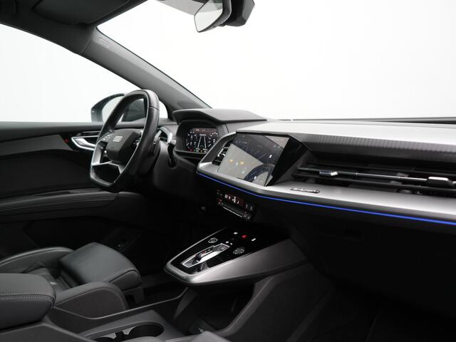 Audi Q4 e-tron 50 quattro S Line 77 kWh 299pk Dealer O.H. INCL BTW | Panodak | Lederen Sportstoelen Verwarmd | Keyless | Navigatie | Cruise Control | Virtual | DAB | Taifungrau Metallic |