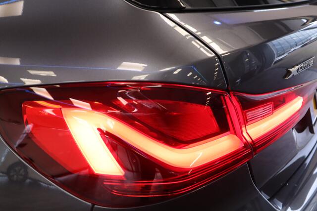 BMW 1-SERIE M135i xDrive High Executive Edition 306PK Headup Display Navigatie PDC VCP Cruise Control 19LMV Volleder interieur Schaal stoelen