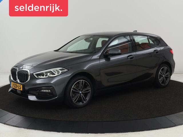 BMW 1-SERIE 116d High Executive | Sport Line | Leder | Stoelverwarming | Carplay | Sportstoelen | Navigatie | Parkeerhulp | Live Cockpit | Climate control | Full LED | Cruise control