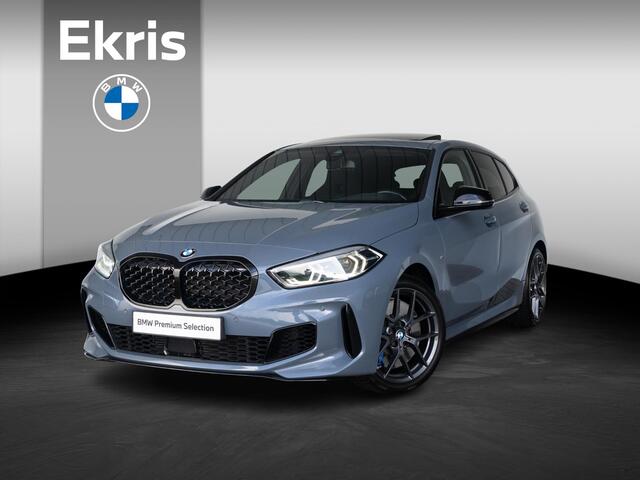 BMW 1-SERIE M135i xDrive | Executive | Comfort Pack | Harman Kardon | Stuurwielrand Verwarmd | Achteruitrijcamera | Comfort Access | Panoramadak | Head-Up Display | 18''