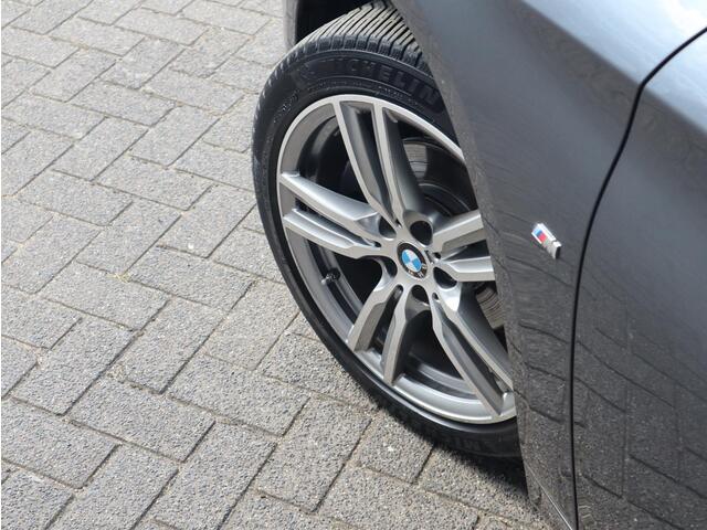 BMW 2-SERIE Active Tourer 218i Centennial High Executive | Head-Up | Leder | Stoelverwarming |