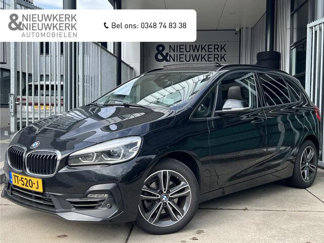 BMW 2-SERIE Active Tourer 218i High Executive | AUTOMAAT | HEAD-UP DISPLAY | LEDER | SCHUIF/KANTELDAK | NAVI XL | CAMERA | CRUISE CONTROL | CLIMATE CONTROL | PDC V+A | LMV 17'' | STOELVERWARMING | BLUETOOTH