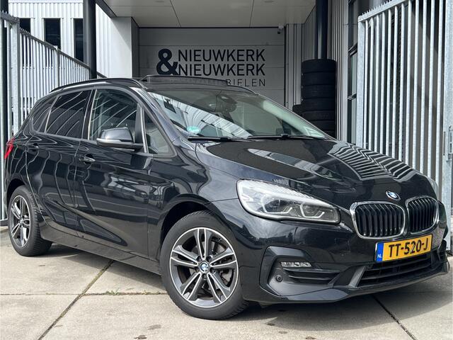 BMW 2-SERIE Active Tourer 218i High Executive | AUTOMAAT | HEAD-UP DISPLAY | LEDER | SCHUIF/KANTELDAK | NAVI XL | CAMERA | CRUISE CONTROL | CLIMATE CONTROL | PDC V+A | LMV 17'' | STOELVERWARMING | BLUETOOTH