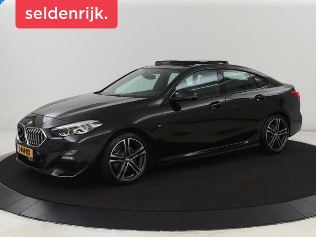 BMW 2-SERIE Gran Coupé 218i M-Sport | Panoramadak | Stoelverwarming | Camera | Sfeerverlichting | Carplay | Half leder | Sportstoelen | Navigatie | Live Cockpit | Full LED | Park Assist | Cruise control | Climate control