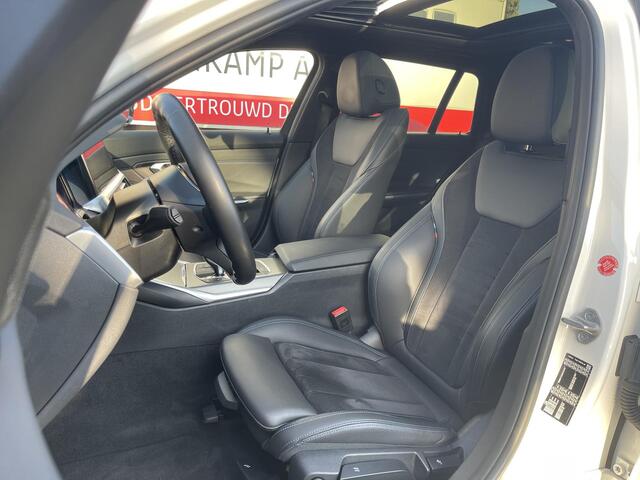 BMW 3-SERIE Touring 318i High Executive M Sport 18"/Panoramadak/Laser LED/Harman Kardon/Dodehoek/Adaptieve cruise/Keyless/Stoelverwarming