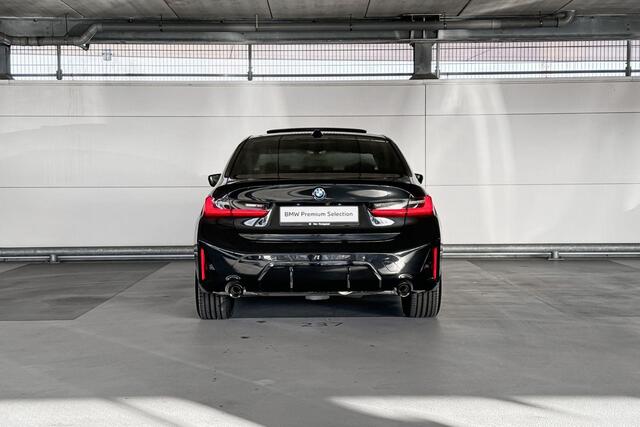 BMW 3-SERIE Touring 320e | M Sportpakket | Trekhaak met elektrisch wegklapbare kogel