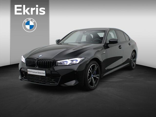 BMW 3-SERIE Sedan 320e M Sportpakket | Travel Pack | Innovation Pack | Entertainment Pack | Stuurwielrand verwarmd | Trekhaak | Schuifdak | 18''