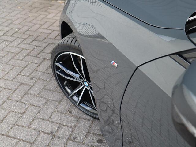 BMW 3-SERIE Touring 320i High Executive Edition | Head Up | Adaptief Cruise | Panodak |