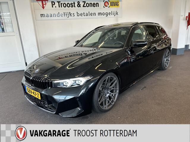 BMW 3-SERIE Touring 318i M Sport | Panoramadak | Fabrieksgarantie | 20''INCH | Verlaagd | Lederen bekleding | Afneembare trekhaak | Cruise control | Climate control | Lane assist | Apple carplay | Full LED