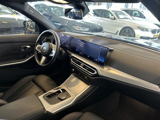 BMW 3-SERIE Touring 318i M Sport | Panoramadak | Fabrieksgarantie | 20''INCH | Verlaagd | Lederen bekleding | Afneembare trekhaak | Cruise control | Climate control | Lane assist | Apple carplay | Full LED