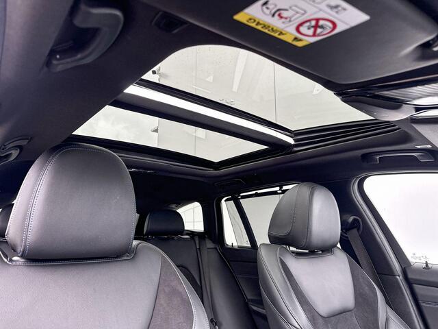 BMW 3-SERIE Touring 320e High Executive M-Sport 18 Inch / Glazen Schuifdak / Getinte Ramen Achter / Stoelverwarming / Binnen & Buitenspiegel Automatisch Dimmend / Harman Kardon