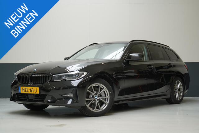 BMW 3-SERIE Touring 330e Business Edition Plus | Adaptive cruise | Trekhaak | Sportstoelen | Apple Carplay