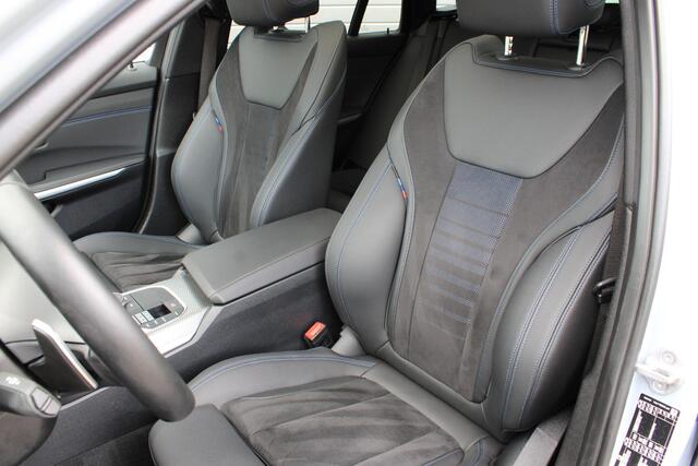 BMW 3-SERIE Touring 330e xDrive Touring M Sport Facelift | Pano | Trekhaak | Laser LED | Shadowline | Comfort Access | Sfeerverlichting | Brooklyn Grau | BTW