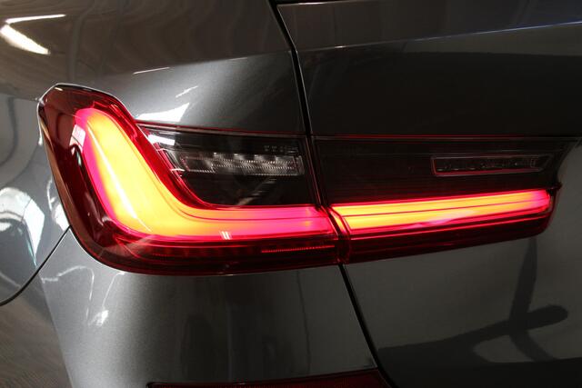 BMW 3-SERIE Touring 330e Business Edition Plus Adaptieve cruise control | Climate control | Stoel/stuur verwarming | Zomer + winterset | Elektrisch uitklapbare trekhaak | Parkeercamera |