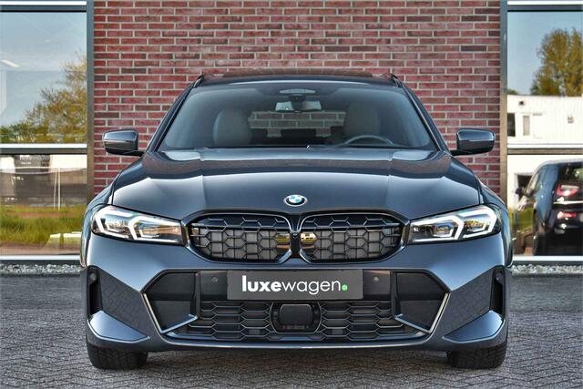 BMW 3-SERIE Touring 330e xDrive M-Sport Pro LCI Dravitgrau Pano HUD el-zetels 19inch