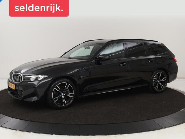 BMW 3-SERIE Touring 330e Business Edition Plus | Wegklapbare trekhaak | Camera | Stoel & Stuurverwarming | Carplay | Leder