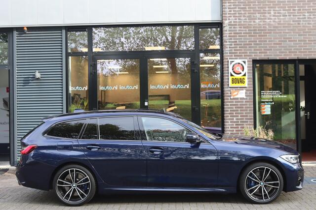 BMW 3-SERIE Touring 330e M-Sport Shadow Line Pano/Laser LED/Keyless/Head-up/DCC/Elek. stoel+mem/Dodehoek/19"/Trekhaak wegkl.