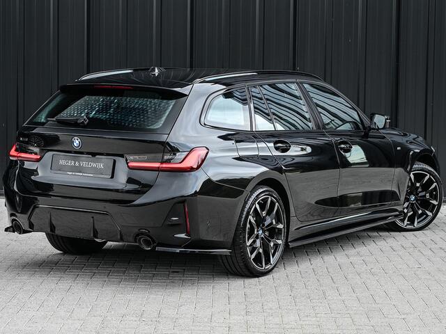 BMW 3-SERIE Touring 330e xDrive M-SPORT | FACELIFT | ACCU 19,5 kWh | ACTIVE CRUISE | ELEKTR. TREKHAAK | HIFI AUDIO | SHADOW LINE | CAMERA | FULL-LED | STUUR- EN STOELVERWARMING