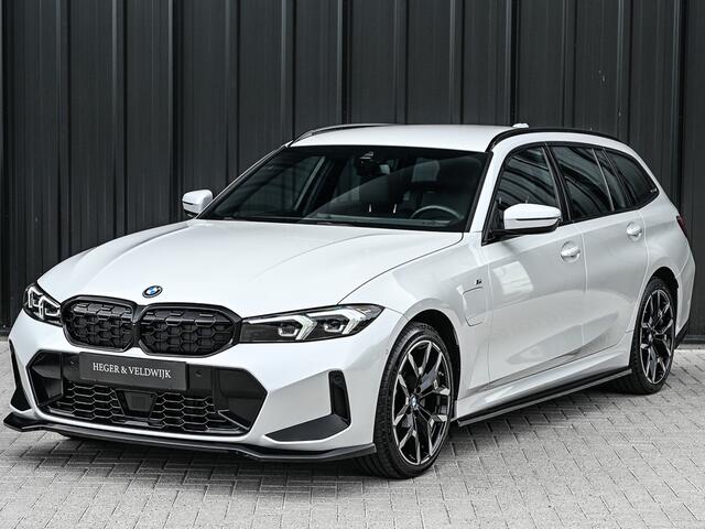 BMW 3-SERIE Touring 330e xDrive M-SPORT | FACELIFT | ACCU 19,5 kWh | ACTIVE CRUISE | ELEKTR. TREKHAAK | HIFI AUDIO | SHADOW LINE | CAMERA | FULL-LED | STUUR- EN STOELVERWARMING