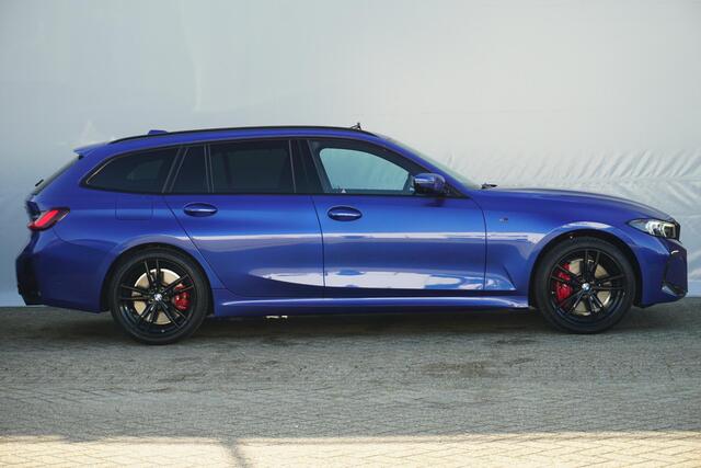 BMW 3-SERIE Touring 330e xDrive M Sport Pro | Trekhaak / Panoramadak / Elektrische Stoelen met Geheugen / Harman Kardon / Driving Assistant Professional