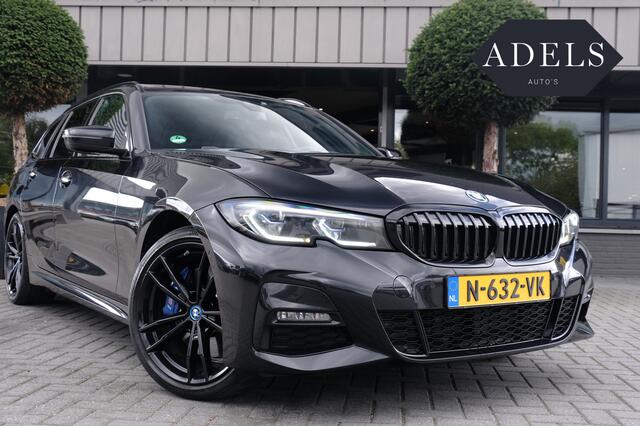 BMW 3-SERIE Touring 330e M Sport Shadow HUD LASERLED PANODAK TREKHAAK CARBON Gratis onderhoud T/M 2027