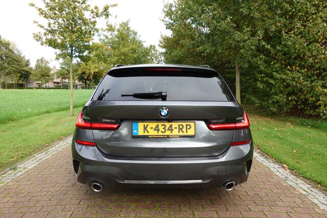 BMW 3-SERIE Touring 320i High Executive M-SPORT | Pano | LED | CarPlay | Stoelverw. | Elektr. klep | Camera |