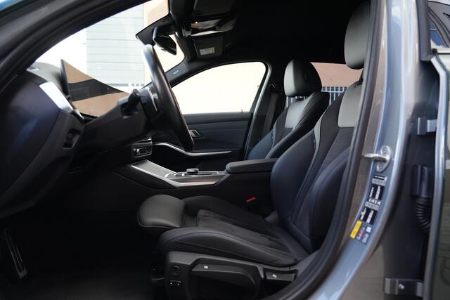 BMW 3-SERIE Touring 330e M Sport High Executive 292pk Navigatie/Stoelverwarming/Camera