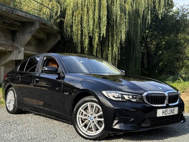 BMW 3-SERIE 320e BUSINESS+ EDITION LEDER/CAMERA/TREKHAAK