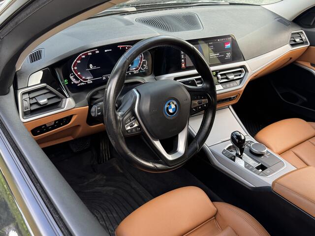 BMW 3-SERIE 320e BUSINESS+ EDITION LEDER/CAMERA/TREKHAAK