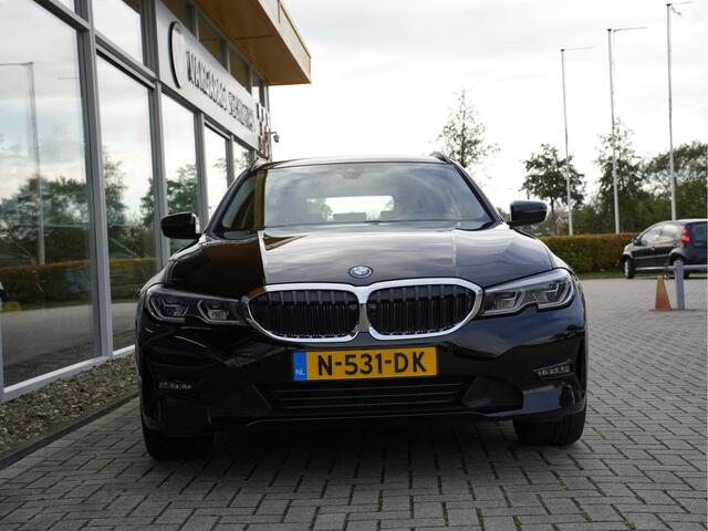 BMW 3-SERIE Touring 320e Business Edition Plus | Navigatie | SOH 91% | Laserlicht | Keyless