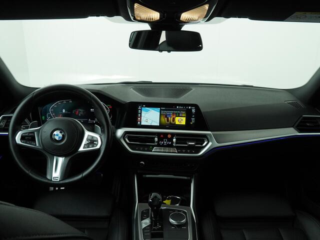 BMW 3-SERIE Touring 320i High Executive Edition | Stoelverwarming | Achteruitrijcamera | Trekhaak |