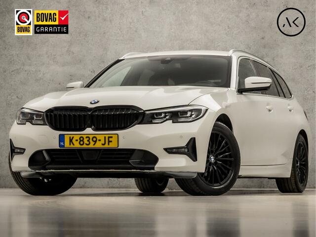 BMW 3-SERIE Touring 318i Sportline 157Pk Automaat (APPLE CARPLAY, GROOT NAVI, ZWART HEMEL, LEDER, STOELVERWARMING, SPORTSTOELEN, CAMERA, ELEK ACHTERKLEP, GETINT GLAS, TREKHAAK, NIEUWSTAAT)