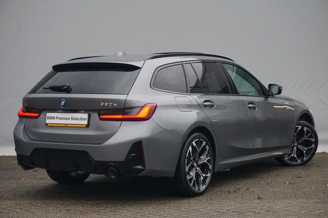 BMW 3-SERIE Touring 330e M Sportpakket Pro 19'' / Panoramadak / Harman Kardon / Driving Assistant Professional / Elektrisch verstelbare stoelen / Trekhaak