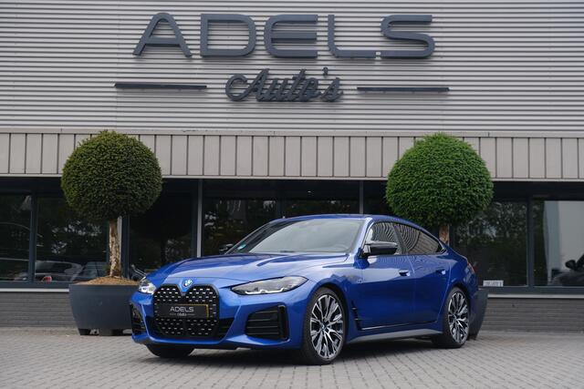 BMW 4-SERIE Gran Coupé M440i xDrive High Executive Portimao Blauw Carbon Harman Kardon