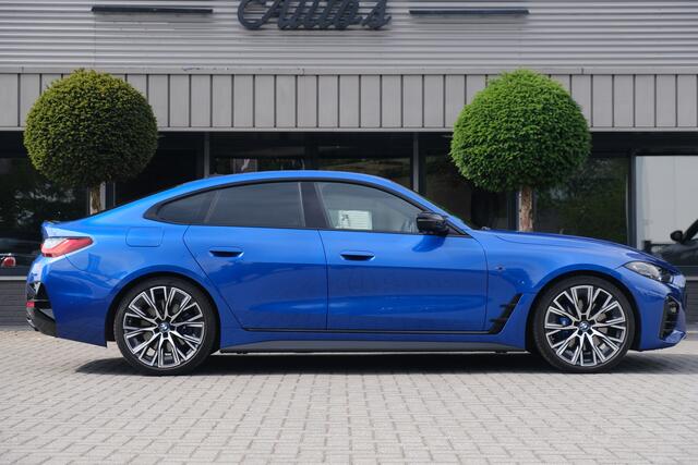 BMW 4-SERIE Gran Coupé M440i xDrive High Executive Portimao Blauw Carbon Harman Kardon