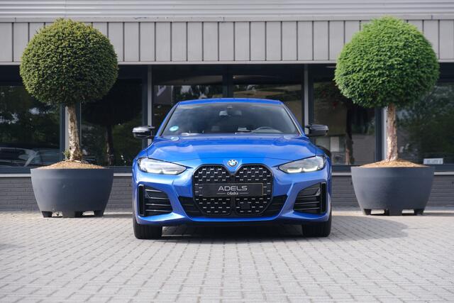 BMW 4-SERIE Gran Coupé M440i xDrive High Executive Portimao Blauw Carbon Harman Kardon