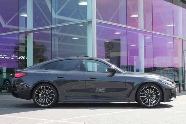 BMW 4-SERIE Gran Coupé M440i xDrive High Executive Automaat / Schuif-kanteldak / Laserlight / M Adaptief onderstel / Parking Assistant Plus / Comfort Access