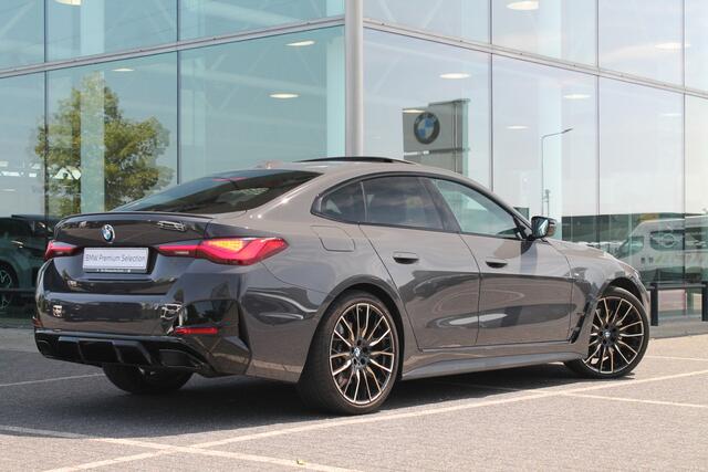BMW 4-SERIE Gran Coupé M440i xDrive High Executive Automaat / Schuif-kanteldak / Laserlight / M Adaptief onderstel / Parking Assistant Plus / Comfort Access