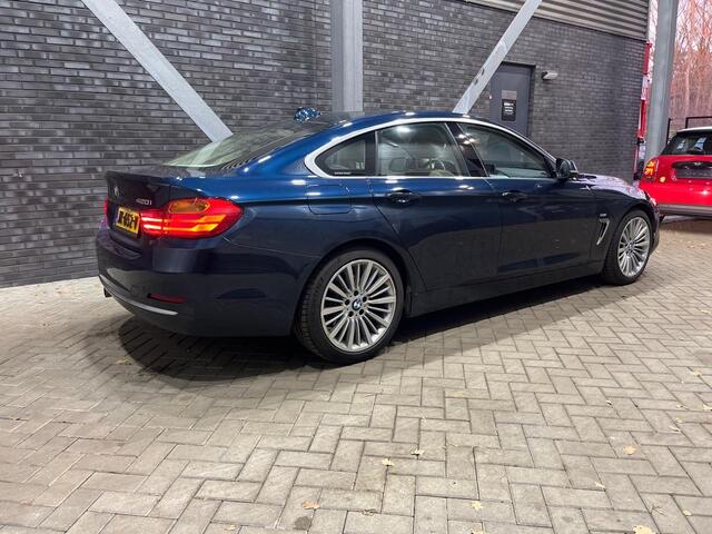BMW 4-SERIE Gran Coupé 420i Centennial Executive | Schuif/Kanteldak | Leder | Harman/Kardon | Camera