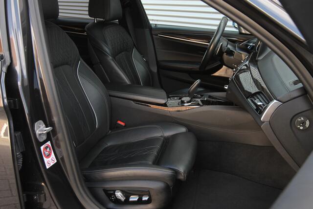 BMW 5-SERIE M550i xDrive High Executive I AUT. I 463 PK I LEDER I SCHUIFDAK I CARPLAY