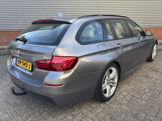 BMW 5-SERIE Touring 520i High Executive | M-Sport | Trekhaak | Panoramadak |