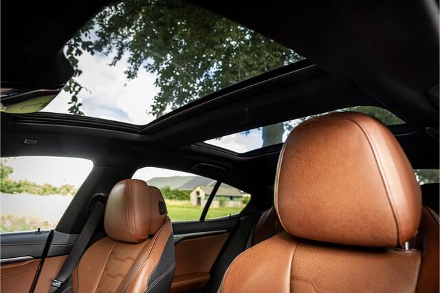 BMW 8-SERIE Gran Coupé 840i xDrive M Sport Frozen Grey Individual Achterasbesturing Soft Close Laser Panorama