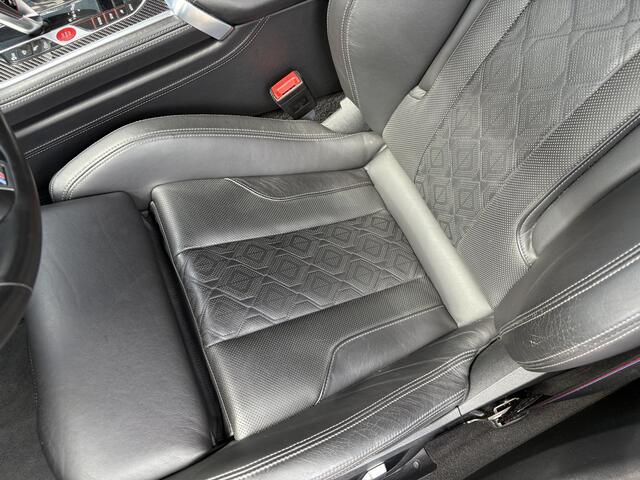 BMW M8 8-serie Gran Coupé Competition, all black.