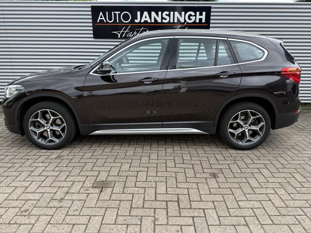 BMW X1 sDrive20i Automaat!! | Trekhaak | PDC | Clima | Cruise | Stoelverwarming | LM Velgen RIJKLAARPRIJS INCL 12 MAANDEN GARANTIE EN BEURT
